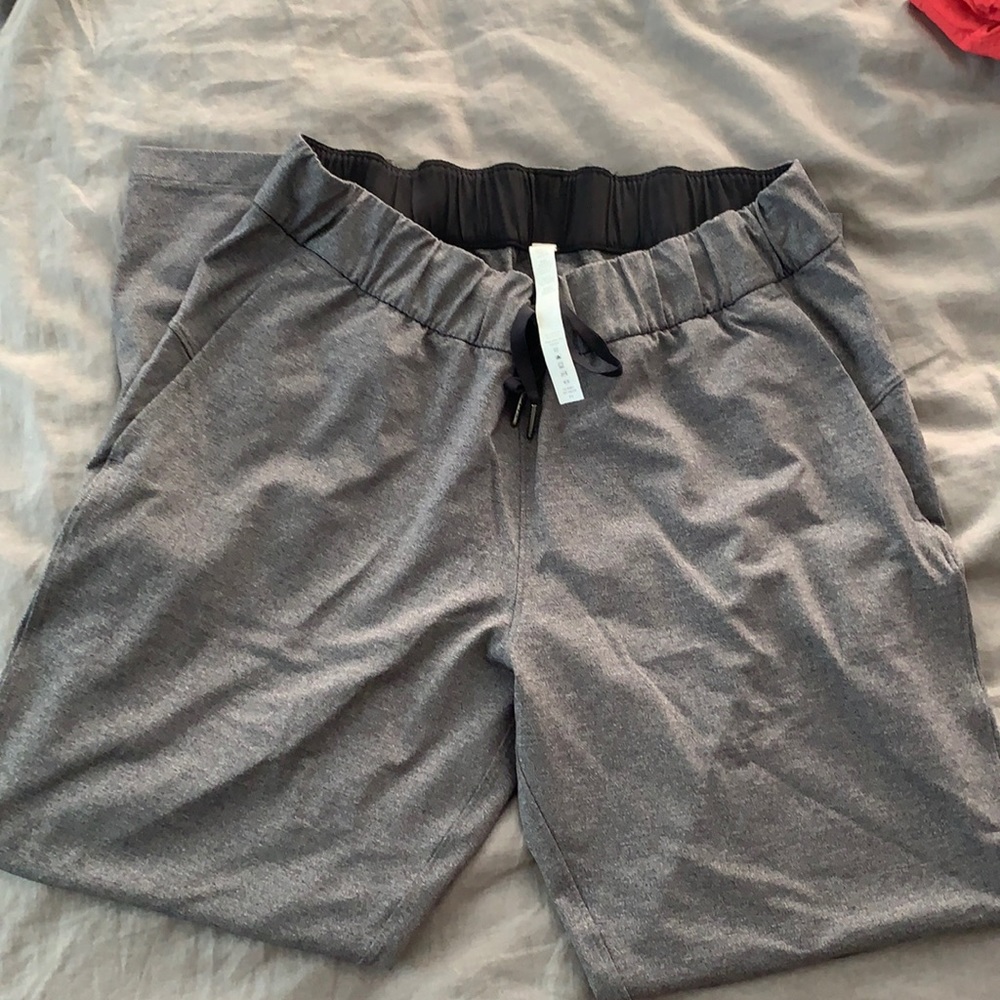 Lululemon on the fly 7/8 pants. Size 10.